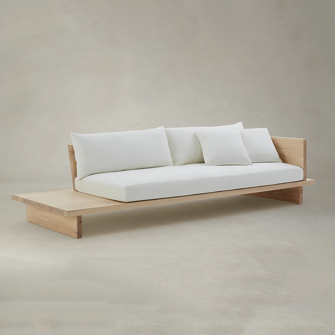 Scandinavian Low Profile Daybed 2 seater sofa with white cushion in minimalist setting