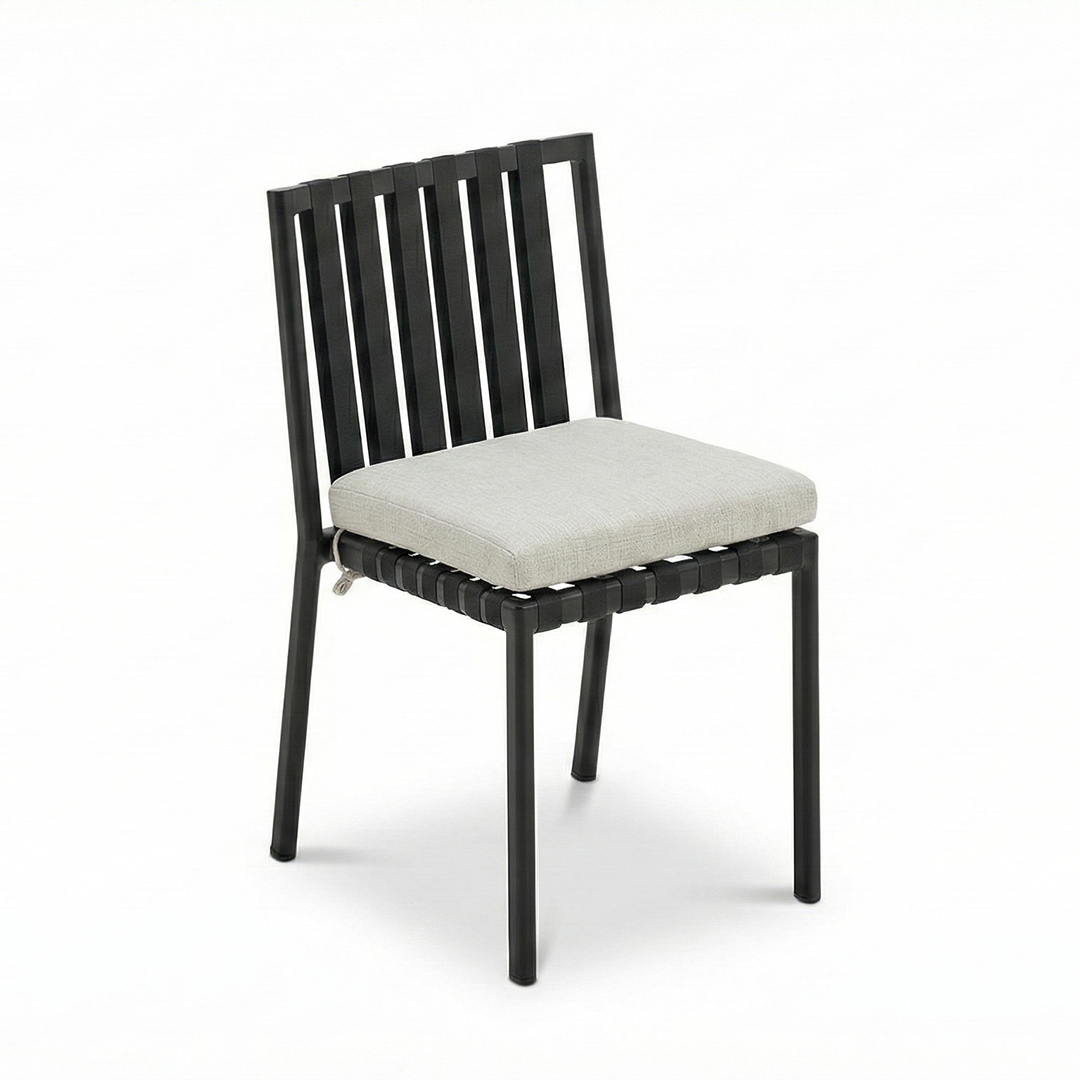 The Porto Outdoor Armchairs arranged on a balcony