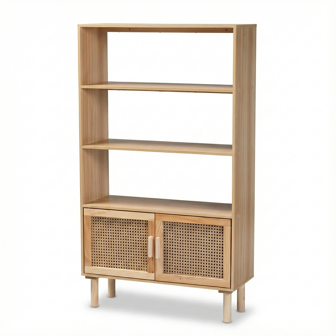 The Coastal Cane Storage Bookcase in a living room